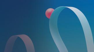 Red ball on curved light blue paper, blue background