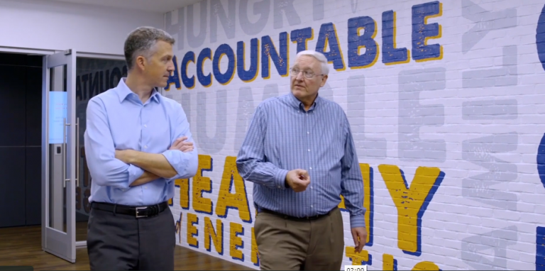 PGIM Private Capital’s David Quackenbush (left) and White Castle CFO Russell Meyer talk business at the mini-burger giant’s corporate headquarters.