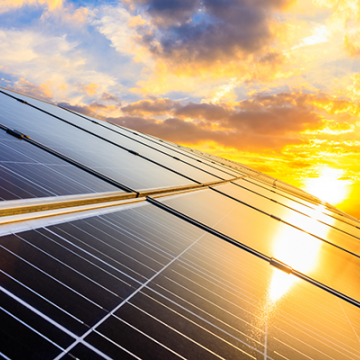 A solar panel reflecting the sun.