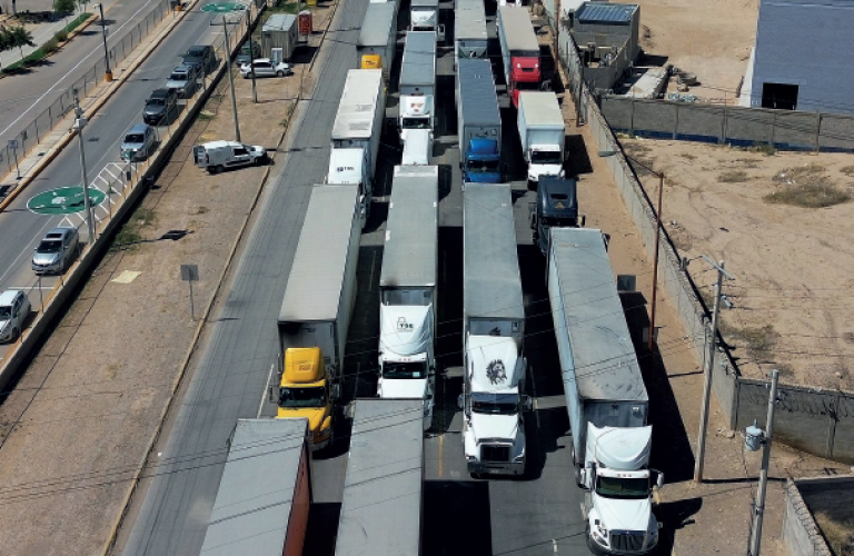 Trucks lining up in Cuidad Juarez waiting to cross from mexico into the us 