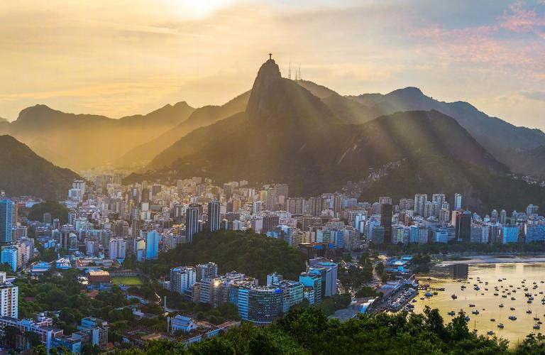 City of Rio de Janerio skyline at sunset with a distant horizon.